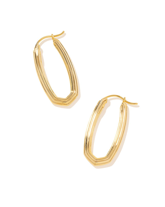 Looking for a modern addition to your hoop collection? Meet the Heather Hoop Earrings. With their elongated oval shape and subtle ridged texture, these hoops have the perfect amount of contemporary flair. Gold