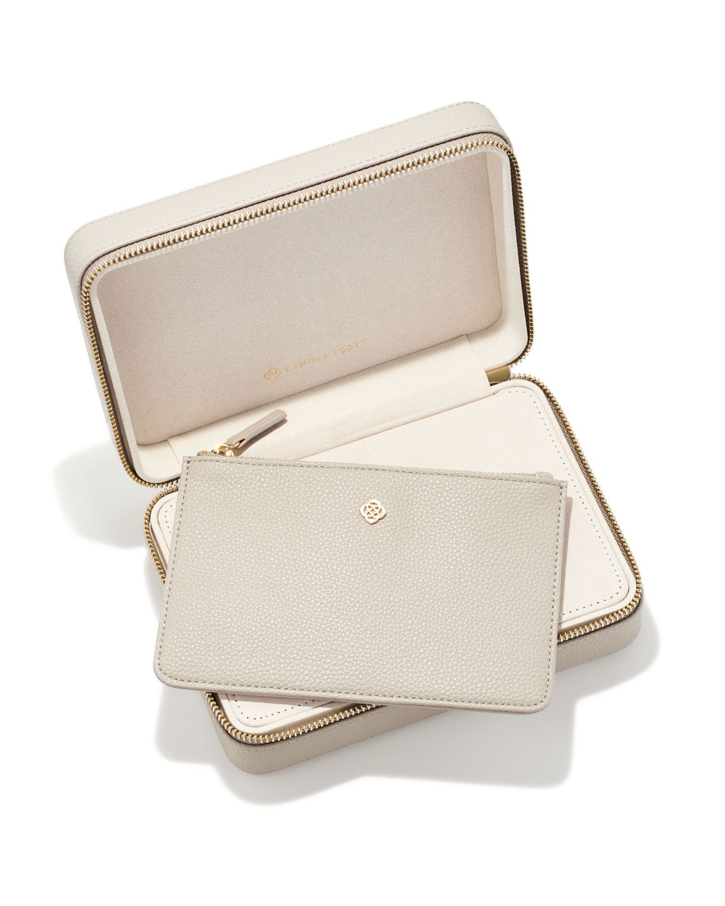 Kendra Scott Medium Zip Jewelry Case Color: Taupe Dimensions: 8"L x 5.5"D x 2.5"H Zipper Closure Removable Pouch