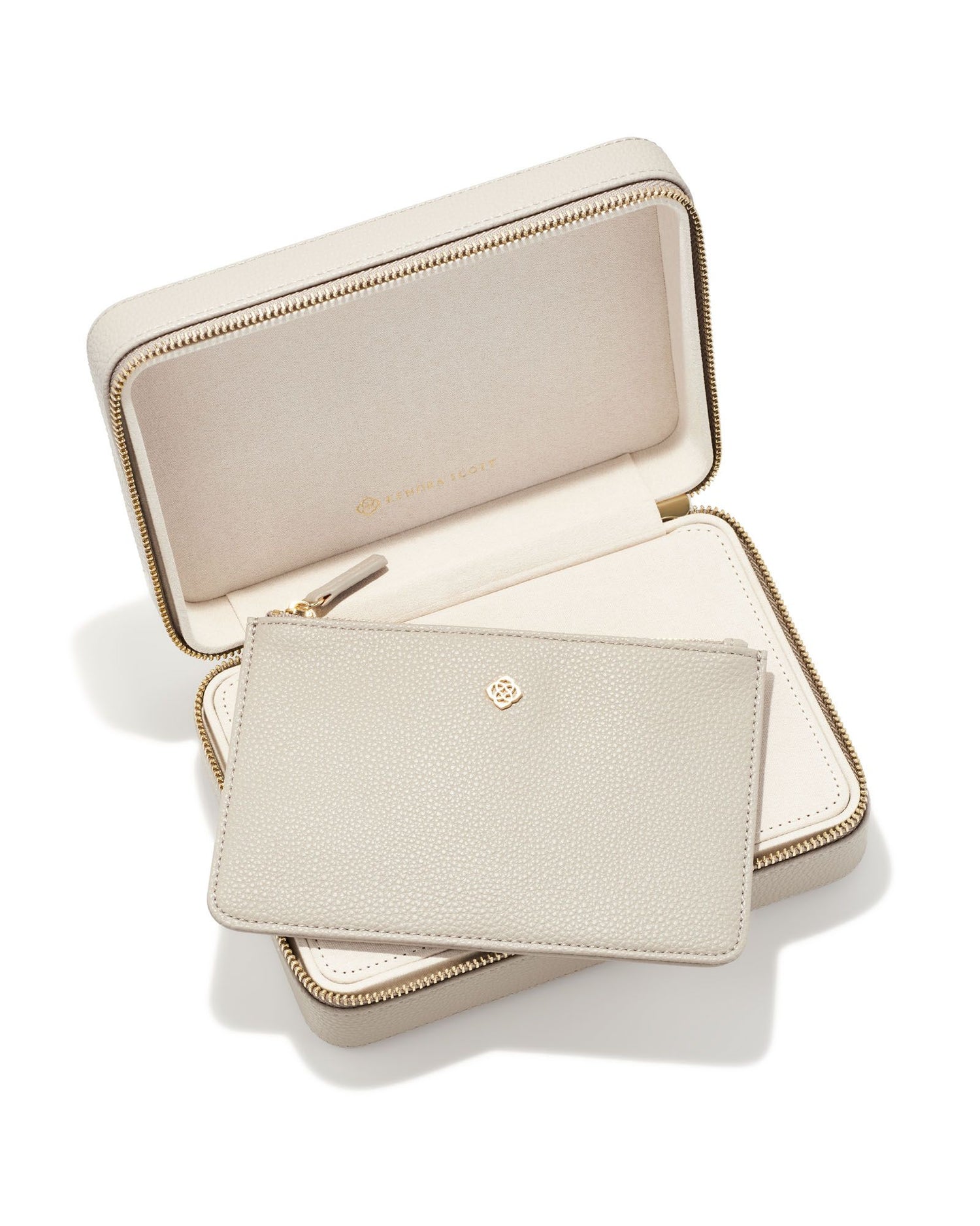 Kendra Scott Medium Zip Jewelry Case Color: Taupe Dimensions: 8"L x 5.5"D x 2.5"H Zipper Closure Removable Pouch