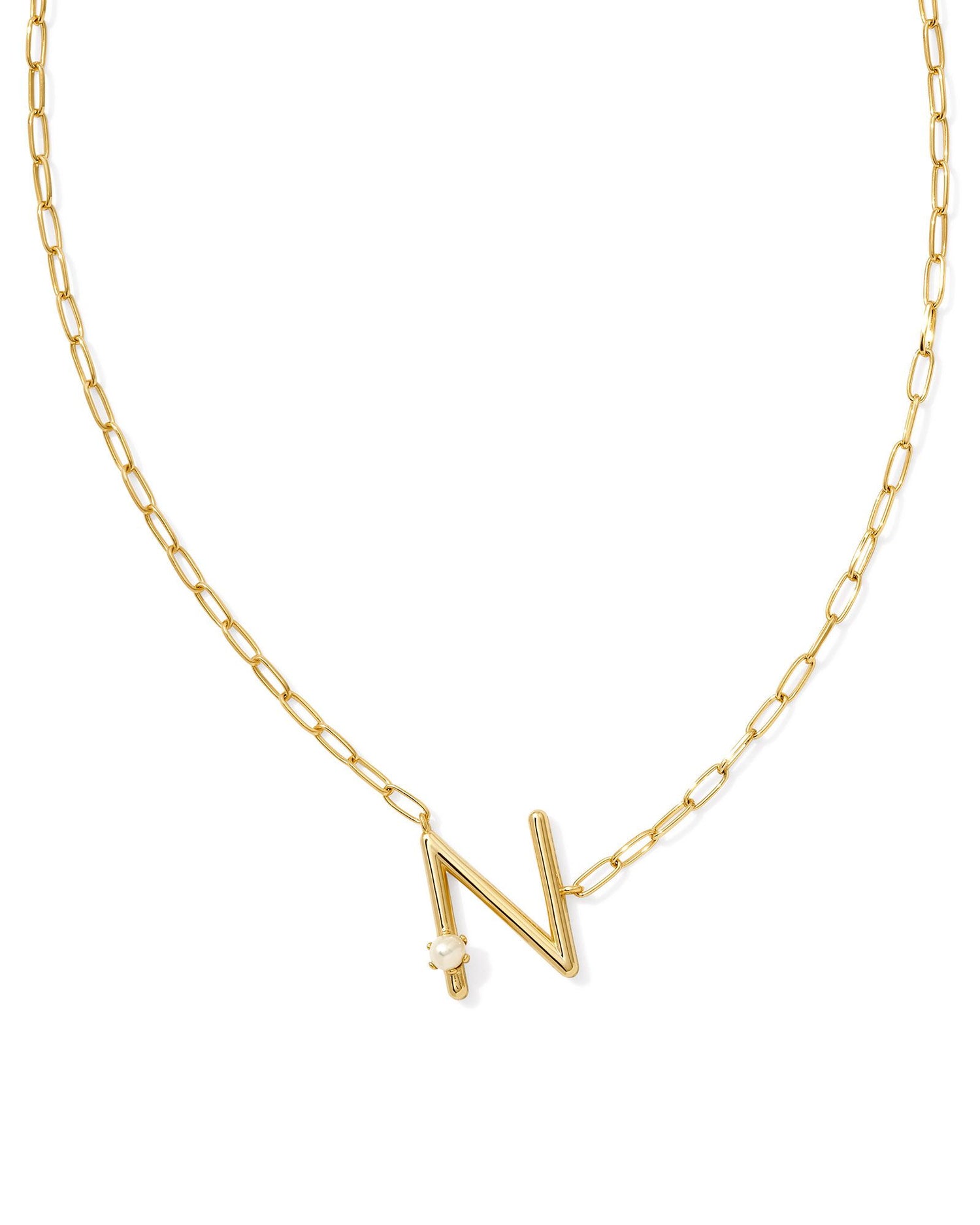 gold necklace with an initial pendant that has a singular pearl stud on it. Initial N