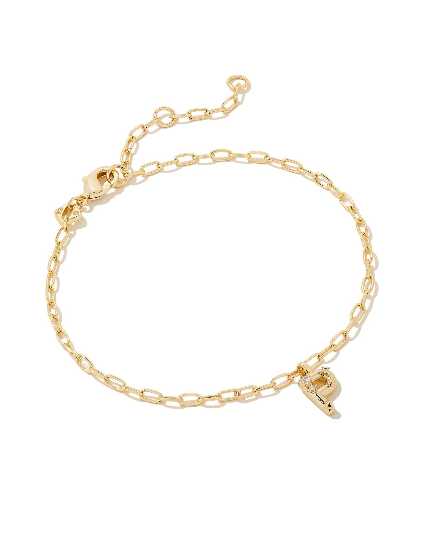 Add a personal touch to your wrist stack with the Crystal Delicate Chain Bracelet in White Crystal, our first Fashion Jewelry initial bracelet. Featuring a dainty chain and letter charm with a hint of sparkle, this bracelet is the perfect way to celebrate the ones you love—including yourself!  Dimensions- 6.5' CHAIN WITH 1.5' EXTENDER, 0.45'L X 0.26"W PENDANT Metal- 14K Gold plated over brass Closure- Lobster Clasp Material-  White CZ Letter P
