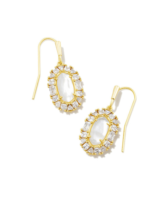 Our iconic Lee shape meets luxurious sparkle in the Lee Gold Crystal Frame Drop Earrings in Ivory Mother of Pearl. Baguette, trillion, and princess cut crystals frame our brand-defining silhouette in its most sparkly rendition yet. Turn heads when you wear these earrings for your next night out.