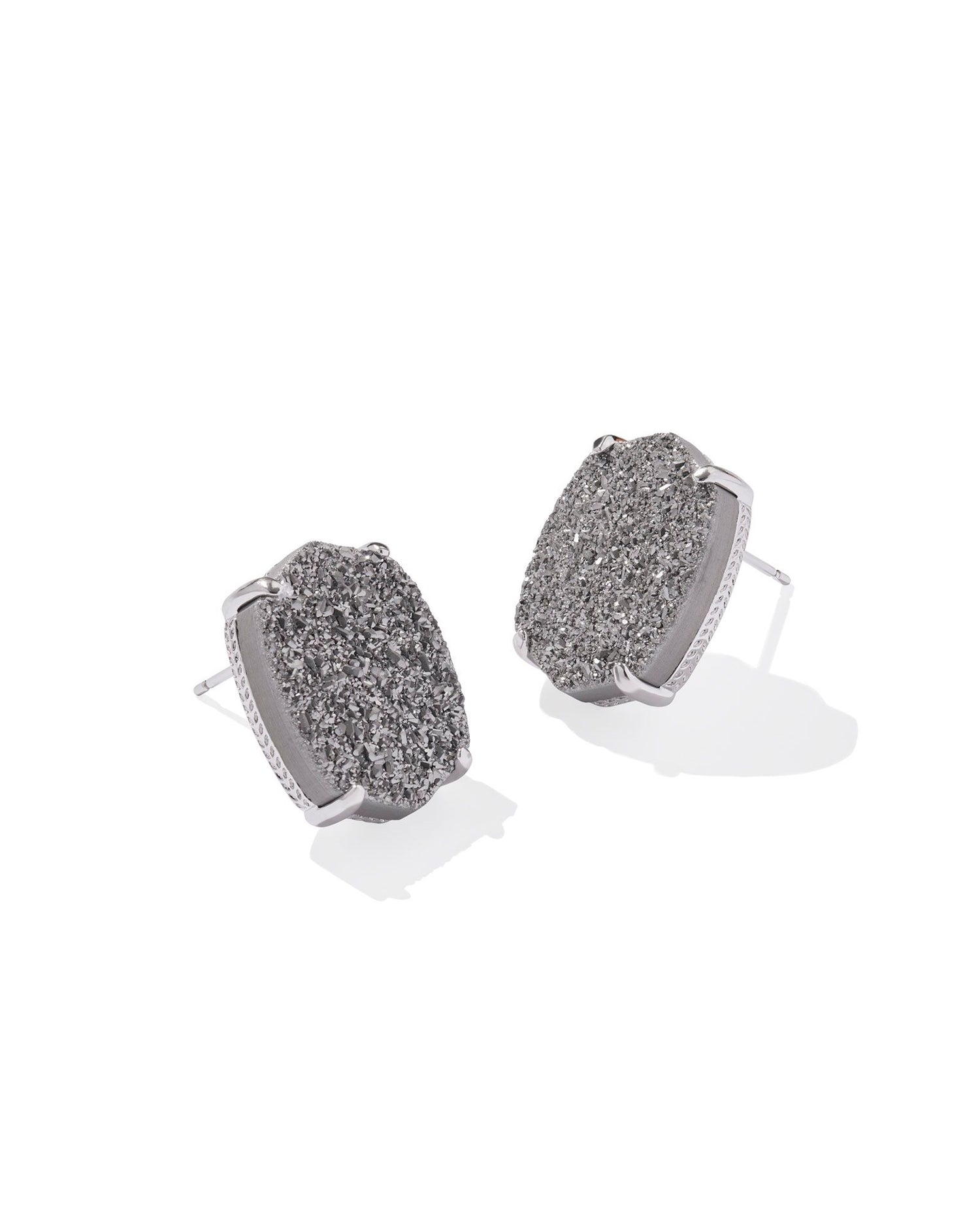 Rhodium post earring holding a Platinum Drusy stone in an oval shape with blunt sides to create a slight point on top and bottom
Size- 0.52' W X 0.69" L