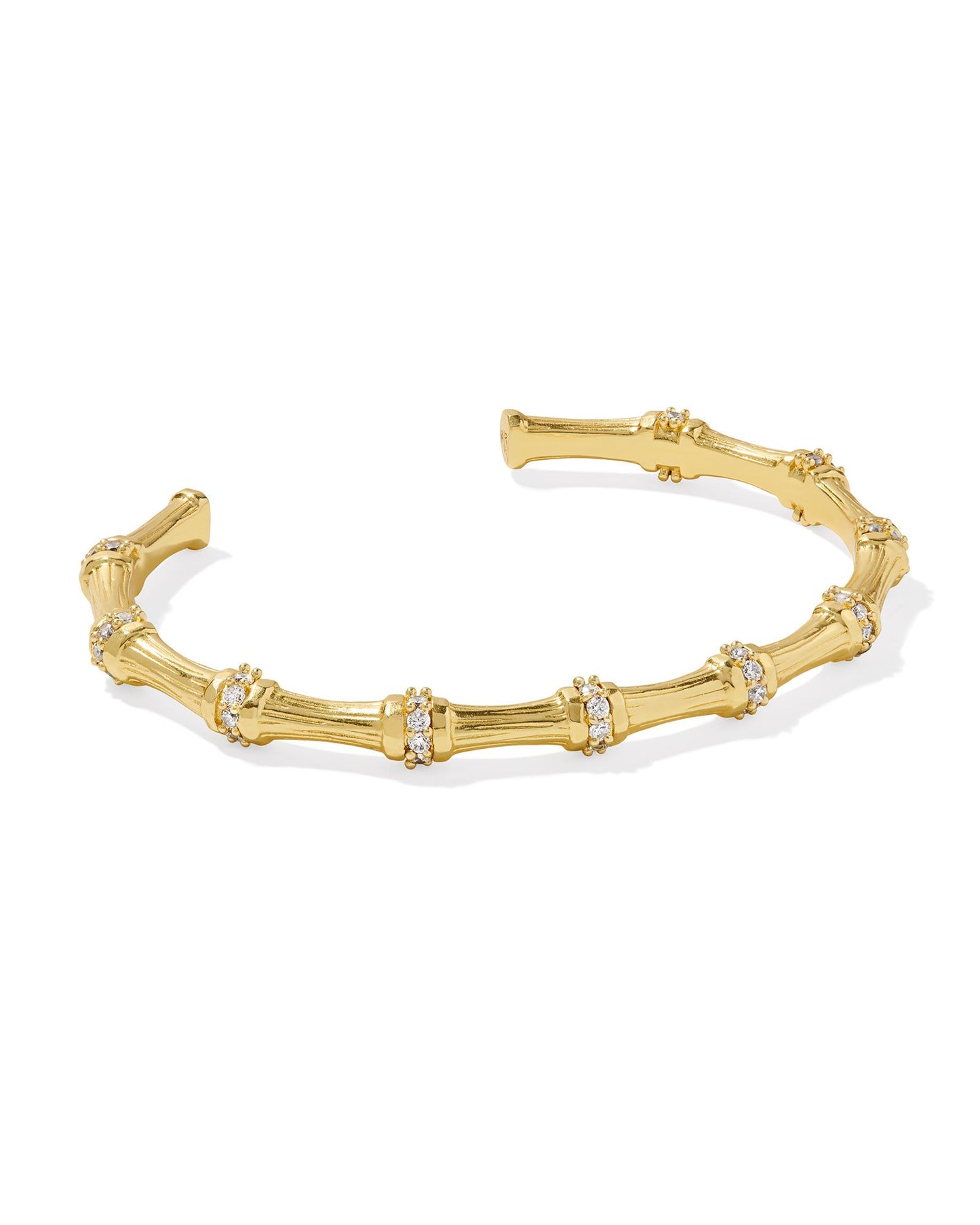 Vintage-inspired design meets the natural structure of bamboo in the Maura Gold Bamboo Cuff Bracelet in White Crystal, adding an eclectic touch to your wrist stack. As if you weren’t already sold, this cuff also boasts crystal detailing, so there’s truly every reason to style this one all season long.