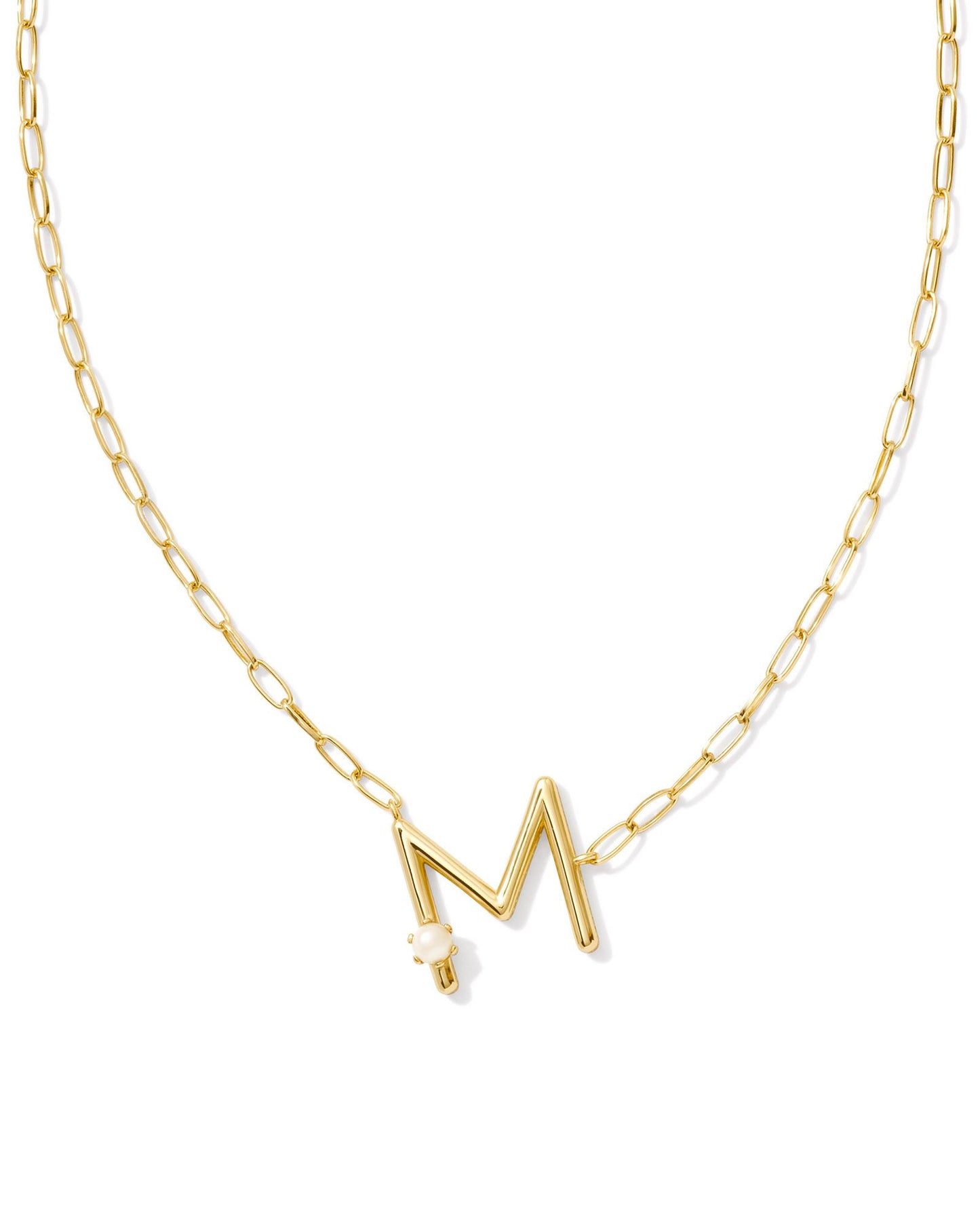 gold necklace with an initial pendant that has a singular pearl stud on it. Initial M