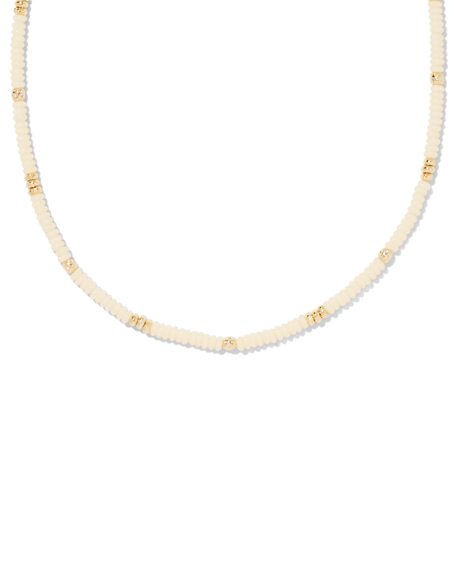 white mother of pearl beaded strand necklace with small detail of gold beads mixed in