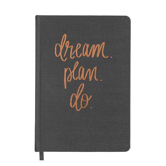 black journal with rose gold lettering that says "dream. plan. do."