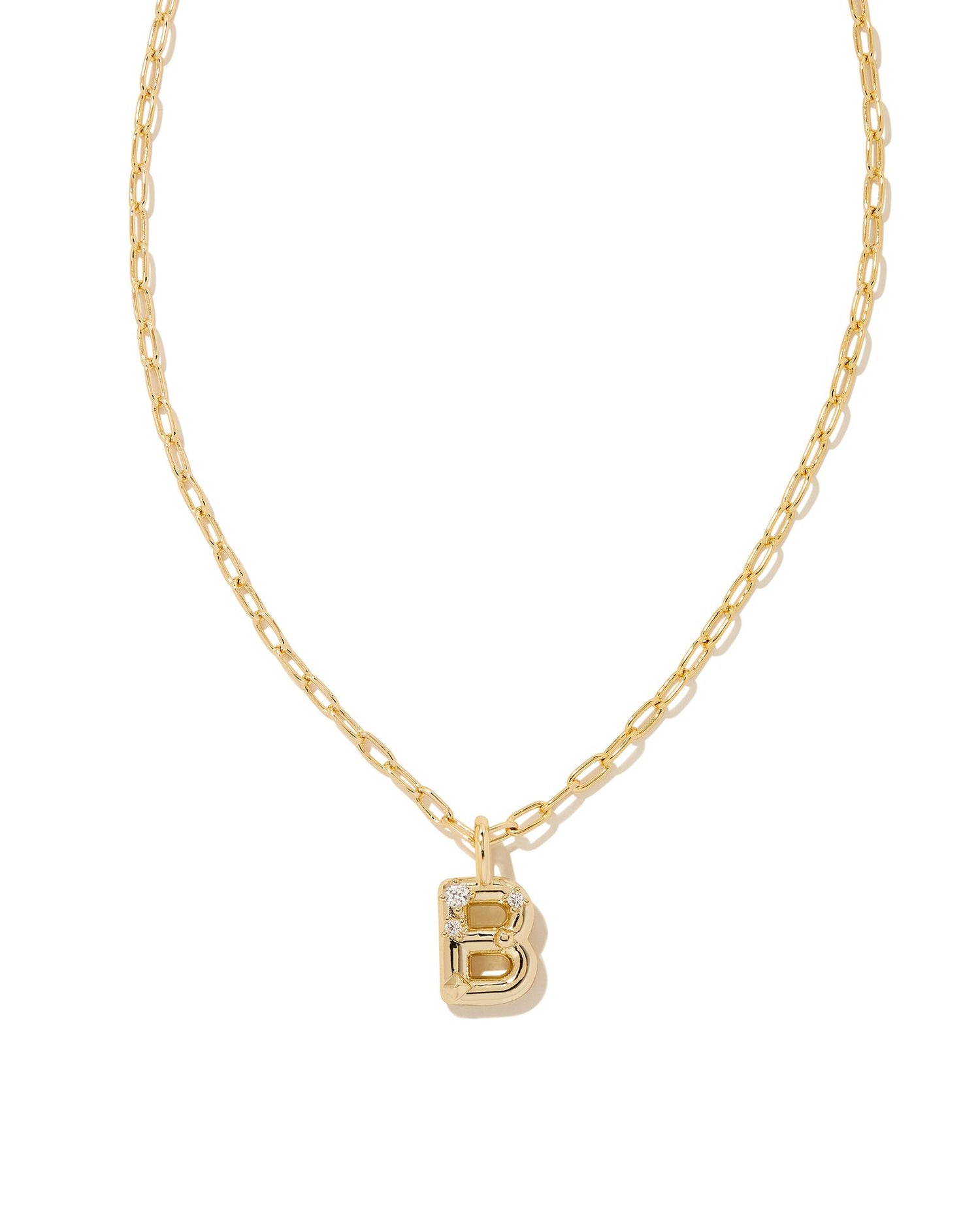 Personalize your everyday look with the Crystal Letter Short Pendant Necklace in White Crystal. Whether you’re rocking your initial or a loved one’s, this sentimental layer is one you’ll keep coming back to again and again.  Dimensions- 16' CHAIN WITH 3' EXTENDER, 0.62'L X 0.35"W PENDANT Metal- 14K Gold plated over brass Closure- Lobster Clasp Material-   White CZ letter B