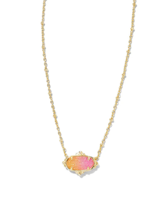 gold pendant necklace with a drusy pink and orange ombre stone. 