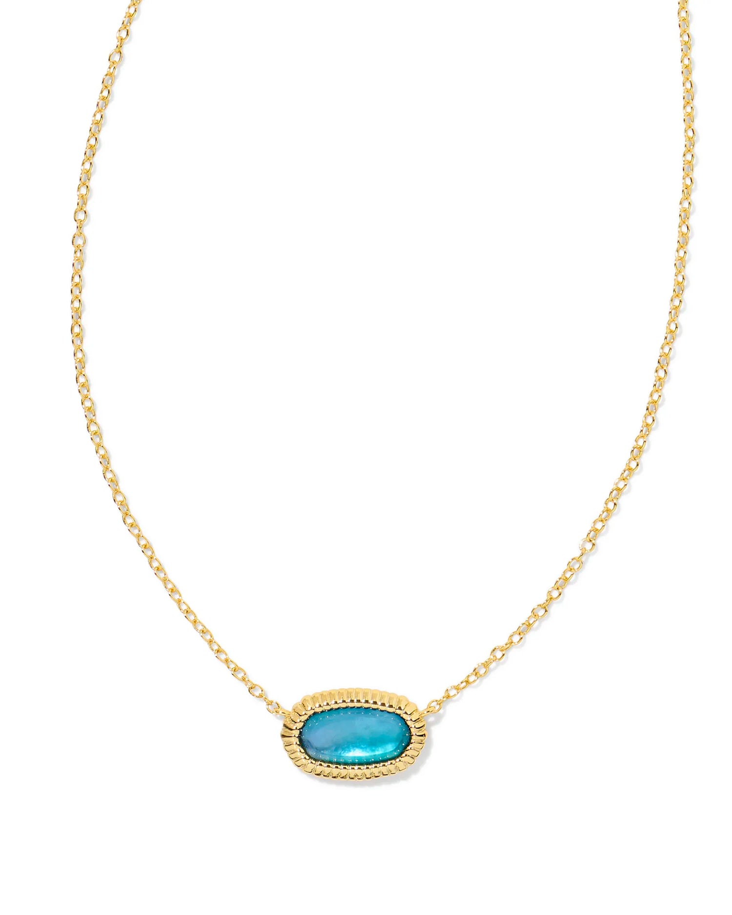 gold necklace with a framed pendant with a blue watercolor stone