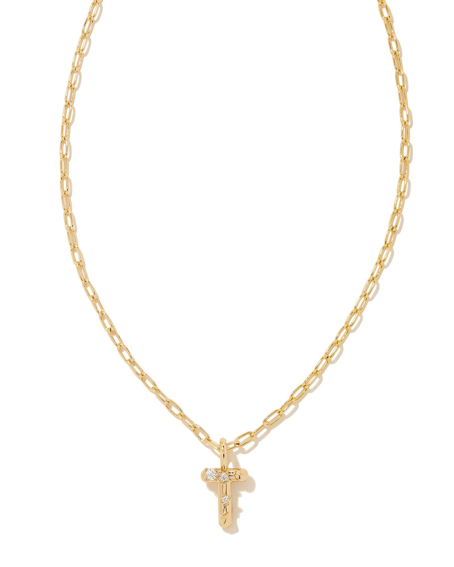 Personalize your everyday look with the Crystal Letter Short Pendant Necklace in White Crystal. Whether you’re rocking your initial or a loved one’s, this sentimental layer is one you’ll keep coming back to again and again.  Dimensions- 16' CHAIN WITH 3' EXTENDER, 0.62'L X 0.35"W PENDANT Metal- 14K Gold plated over brass Closure- Lobster Clasp Material-   White CZ Letter T