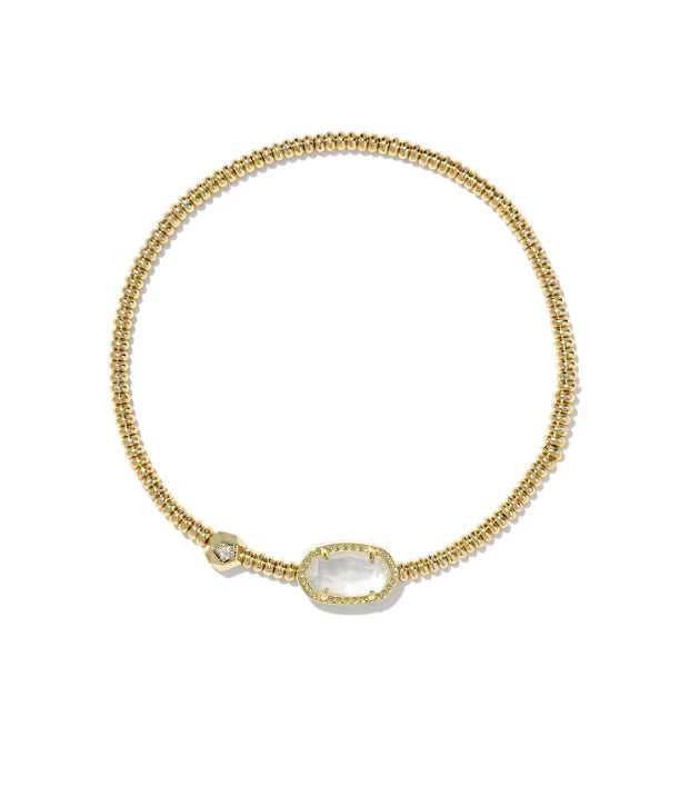 gold stretch bracelet with a oval ivory mother of pearl stone