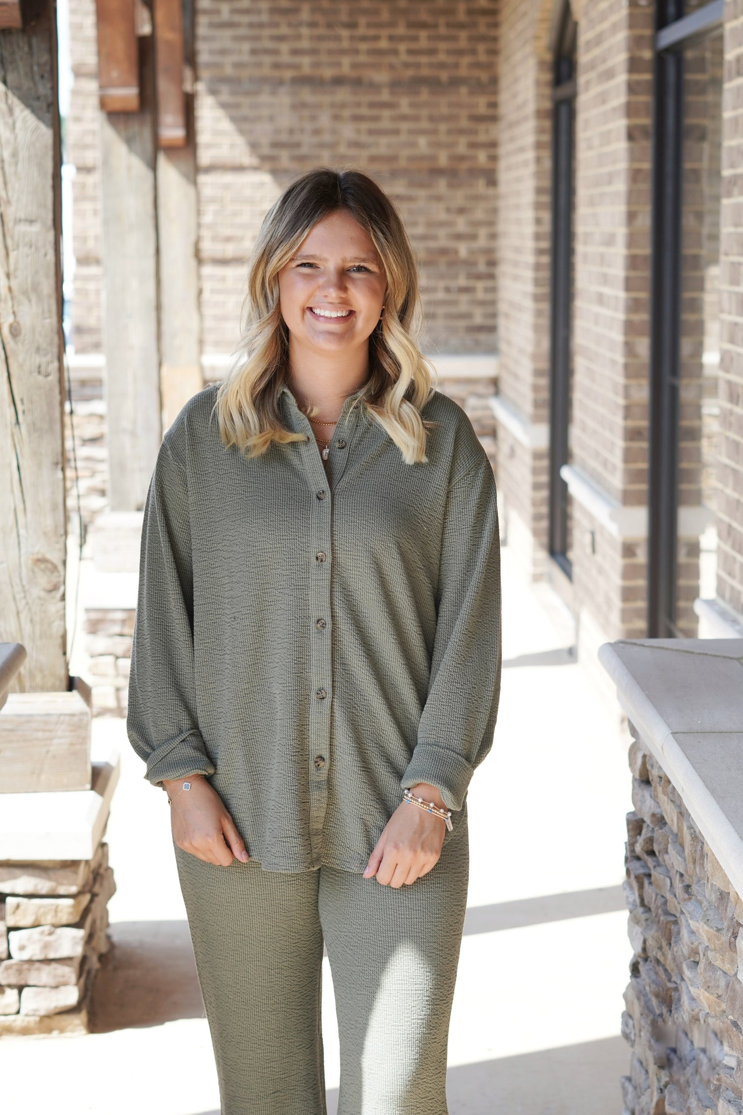 Feel Good Button Up Blouse Collar Neckline Button Up Button Closure Cuffed Sleeve Full Length Relaxed Fit Colors:  Olive Green Fabric Content: 99% Polyester, 1% Spandex