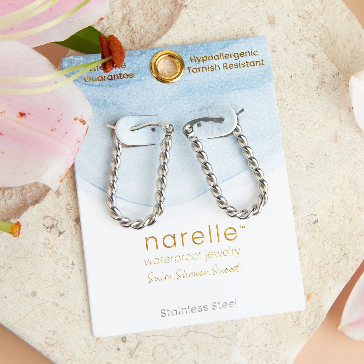 Sliver Hoop Earring with a Twisted Chain Design. 