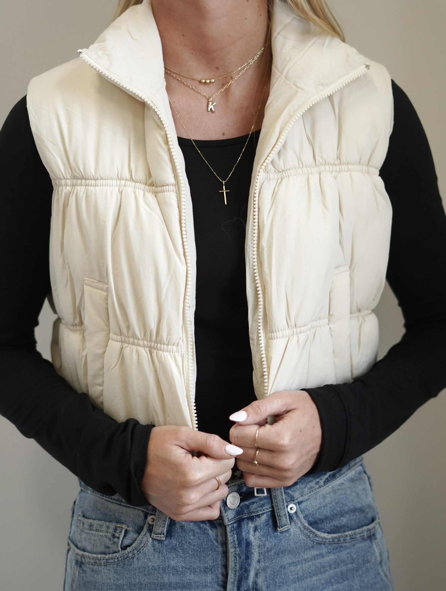 The Essential Cropped Puffer Vest Collar Neckline Sleeveless Pockets Cream color  Cropped Length 100% Nylon