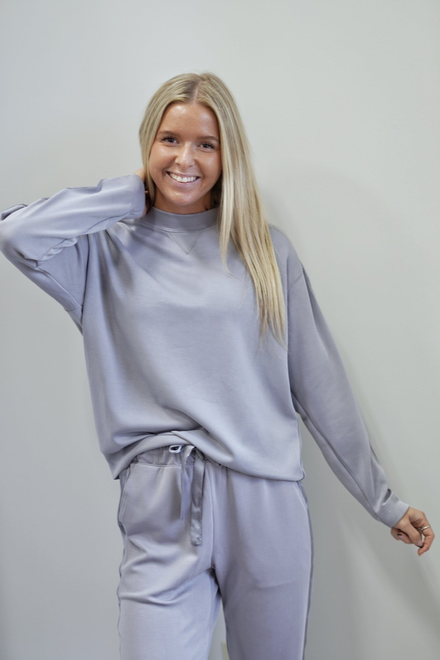 So Sleek Satin Trim Crew Neck Top Crew Neckline Long Sleeves Satin Trim on Sleeves Colors:  Mystic Grey Full Length Relaxed Fit 48% Modal, 46% Polyester, 6% Spandex