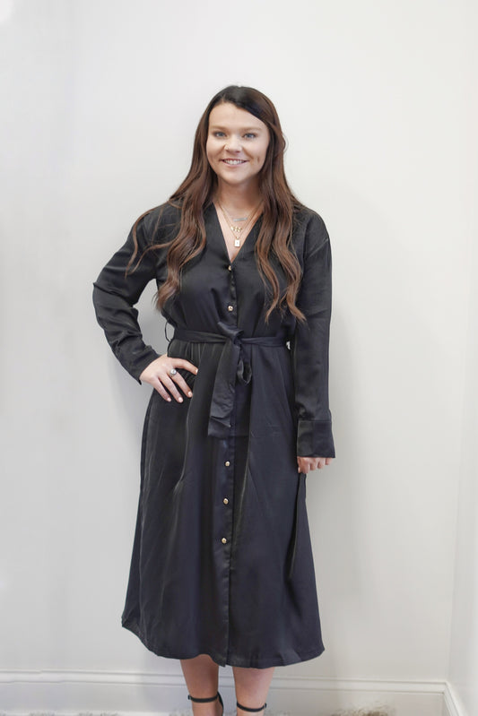Kay Collared Button Down Maxi Dress Collared Neckline Long Cuffed Sleeve Gold Button Down Detail Front Slit Colors: Black Maxi. Length Straight Fit 100% Polyester