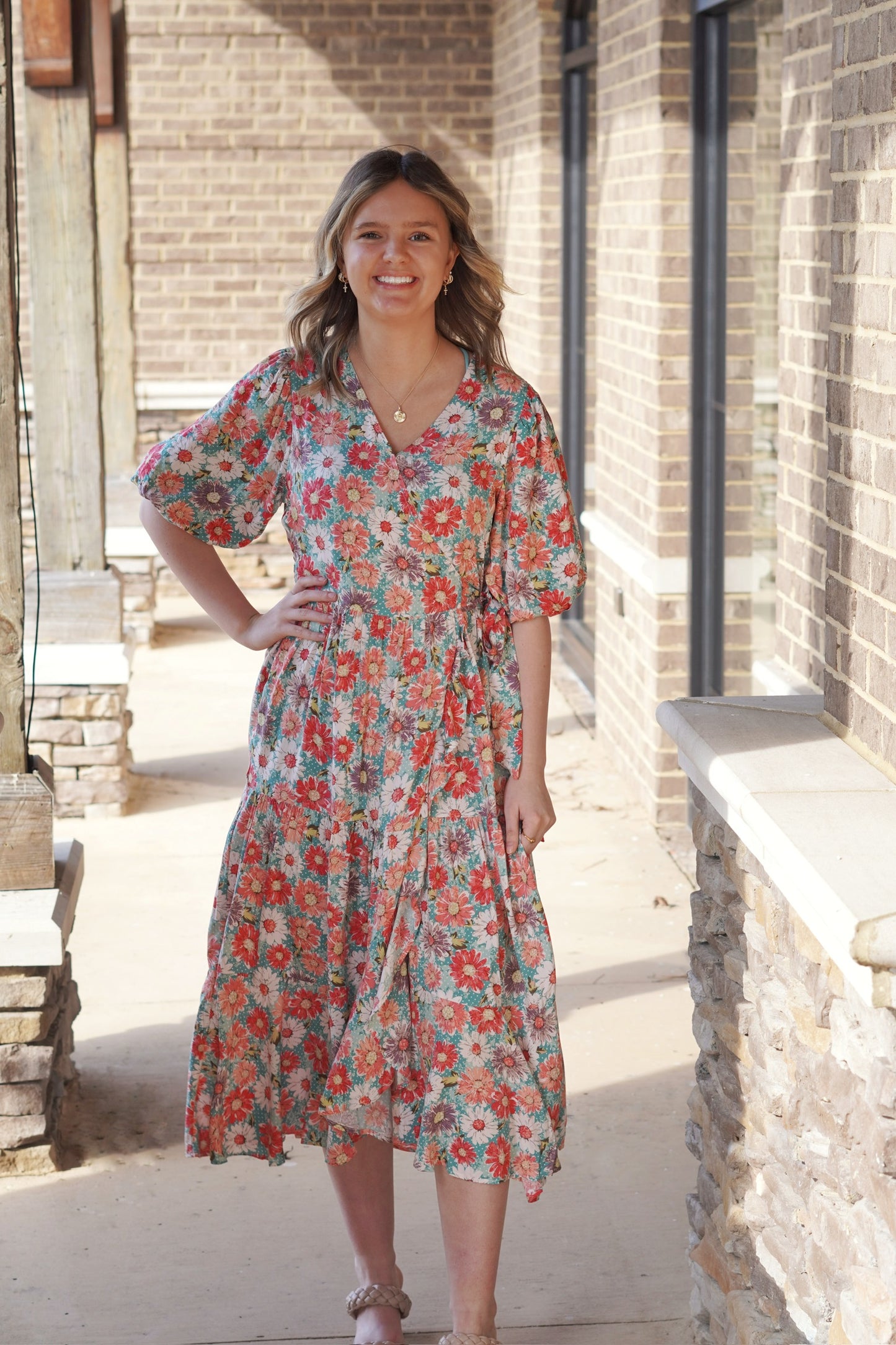 <ul> <li>Full of Bloom Balloon Sleeve Floral Midi Dress</li> <li>V-Neckline w/ Button Clasp</li> <li>Short Balloon Sleeves</li> <li>Wrap Style Slit w/ Ruffle Detail and Waist Tie</li> <li>Tiered Ruffle Detail</li> <li>Tropical Flower Print</li> <li>Multi Colored</li> <li>100% Rayon</li> </ul>