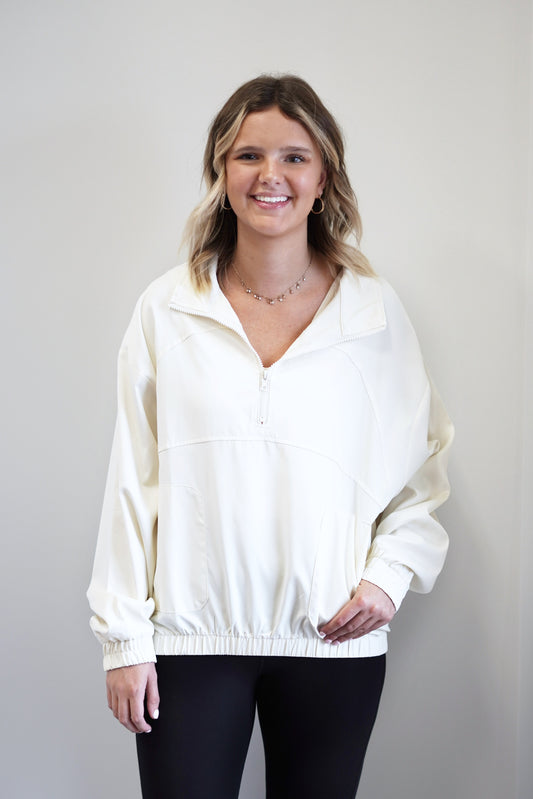 Hannah Half Zip Pullover Half Zip, Collar neckline Color/ Soft Beige Long Sleeve Elastic Band On End Of Sleeves And Waistline Two Front Pockets Relaxed Fit Full Length 100% Polyester