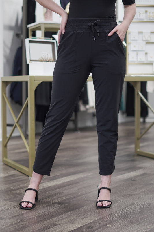 Spanx Casual Fridays Taper Pant High Smocked Waist w/ Waist Tie Tapered Ankle Length Color: Black Pockets Relaxed Fit 88% Polyester, 12% Elastane.