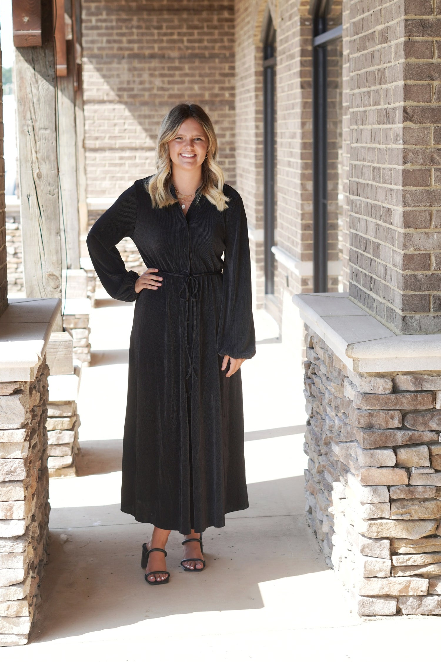 Pretty Pleated Button Down Maxi Dress Button Down Collar Neckline Drawstring Waistline Long Sleeves Maxi Dress Fabric Content: 100% Polyester black color