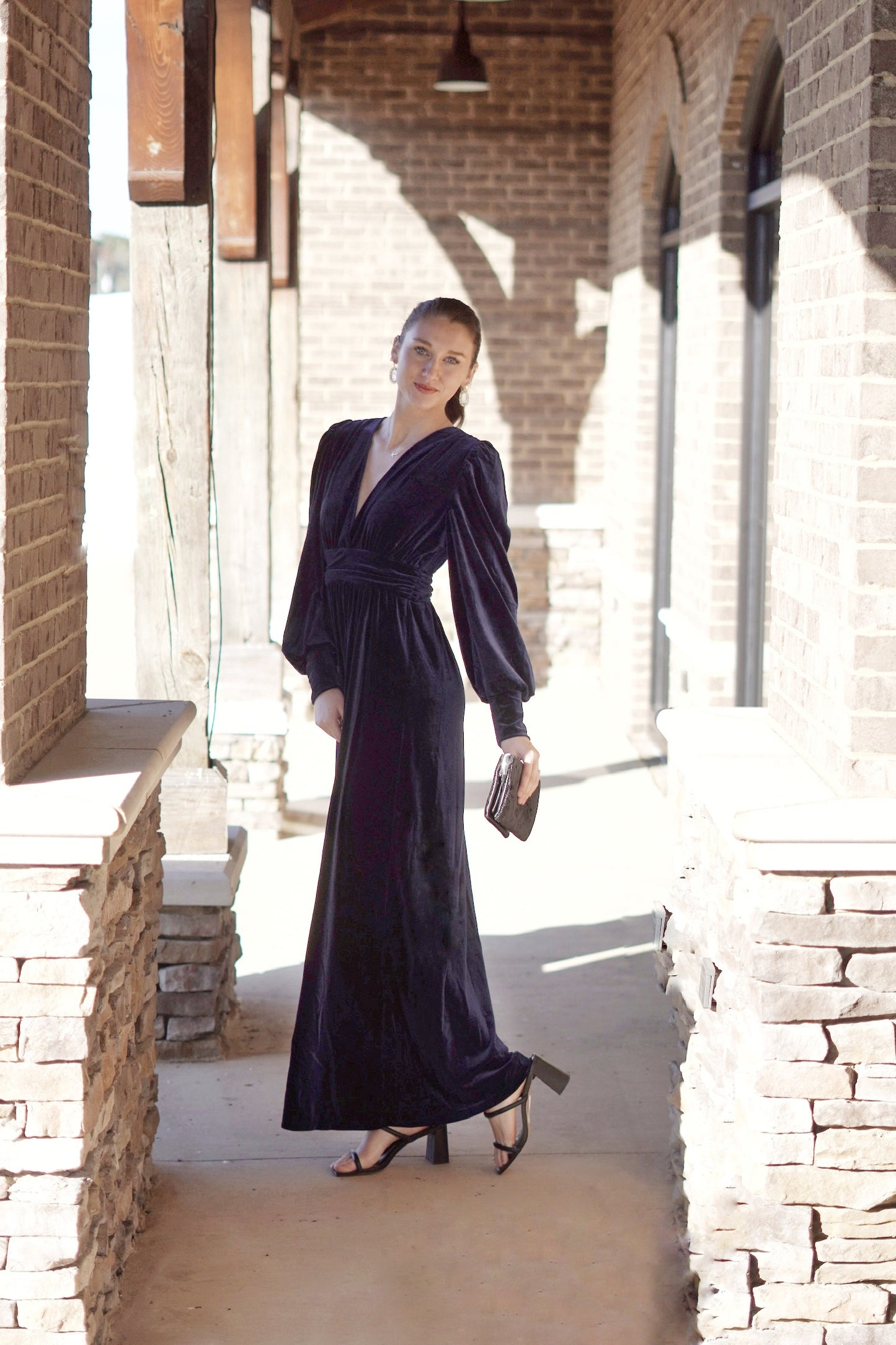 Venezia Velvet Maxi Dress Deep V-Neckline Long Cuffed Sleeves Subtle Puff Sleeves Gathered Waist  Velvet Fabric Deep Blue Color Maxi Length 92% Polyester, 8% Spandex