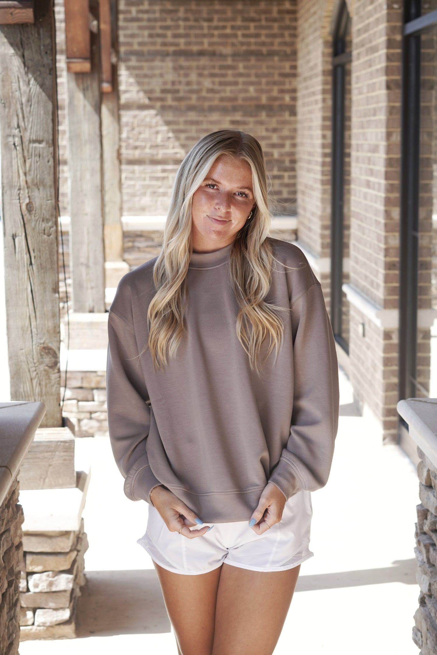 Scuba Mock Neck Pullover Crew Neckline Long Sleeves Relaxed Fit Colors: Mocha Full Length Fabric Content: 48% Modal, 45% Polyester, 7% Spandex