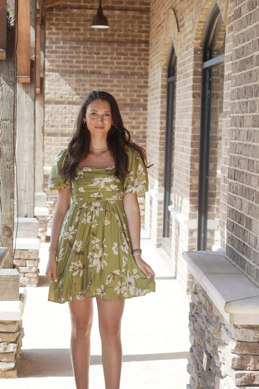 France Floral Puff Sleeve Mini Dress Square Neckline Short Puff Sleeves Pleated Bodice Color: Olive w/ Floral Pattern Mid-Thigh Length A-Line Fit 80% Rayon, 20% Nylon