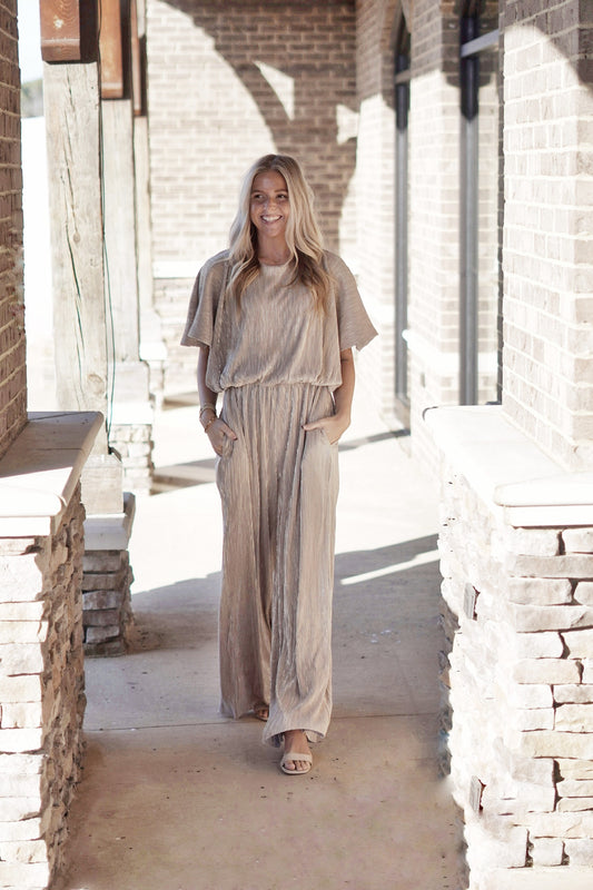 Gal in Gold Metallic Wide Leg Jumpsuit High Round Neckline Short Flutter Sleeves Cinched Waist Full Length Wide Legs Color: Metallic Silver and Gold  100% Polyester