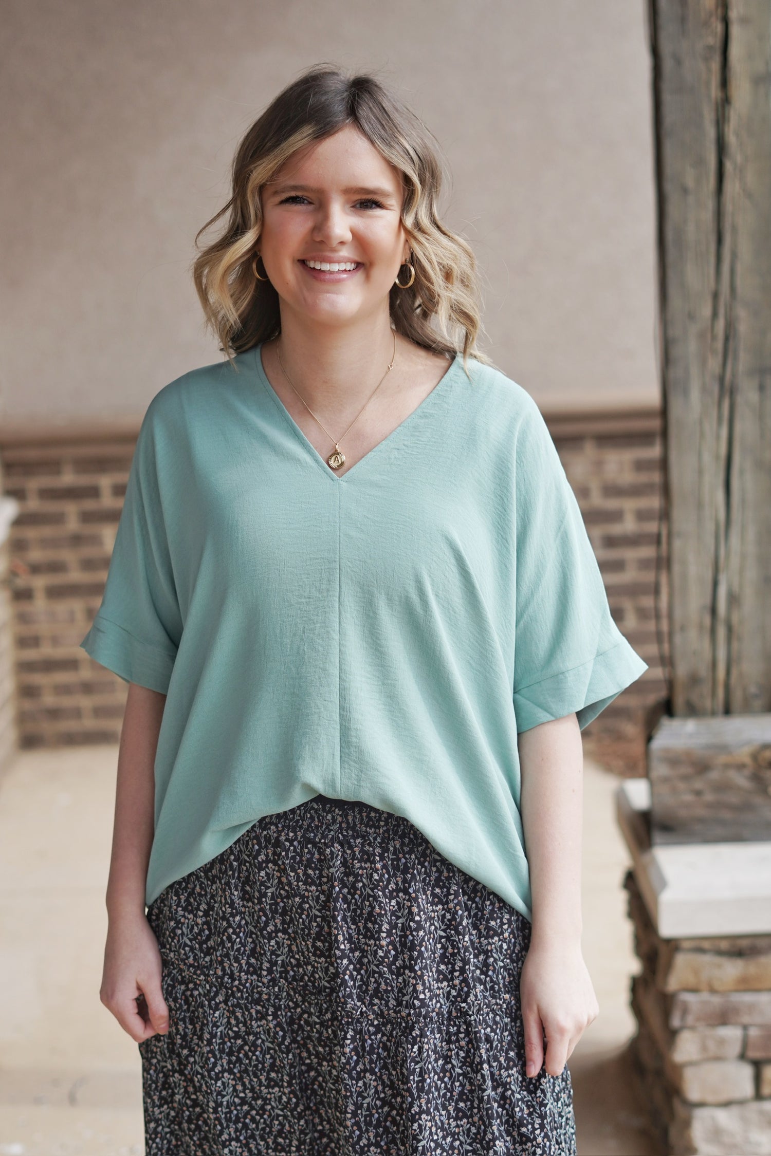 Brighter Days V-Neck Top V-Neckline Short Cuffed Sleeves Lightweight Material Colors: Mint,  Relaxed Fit Full Length 100% Polyester