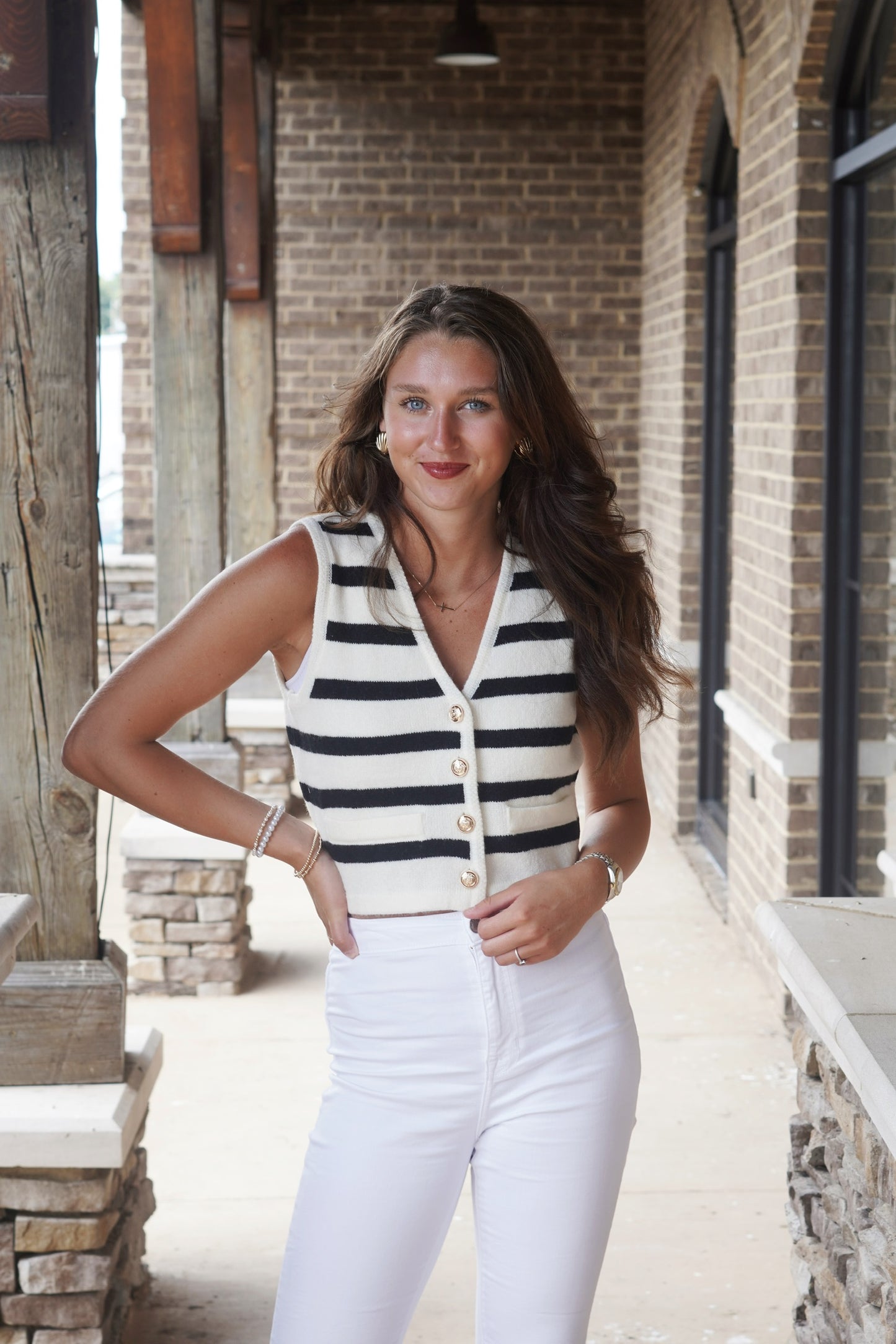 Timeless Striped Sweater Vest V-Neckline Faux Front Pockets Gold Buttons White Striped Sleeveless Cropped Fitted 43% Acrylic, 29% Nylon, 28% Polyester ivory and white striped