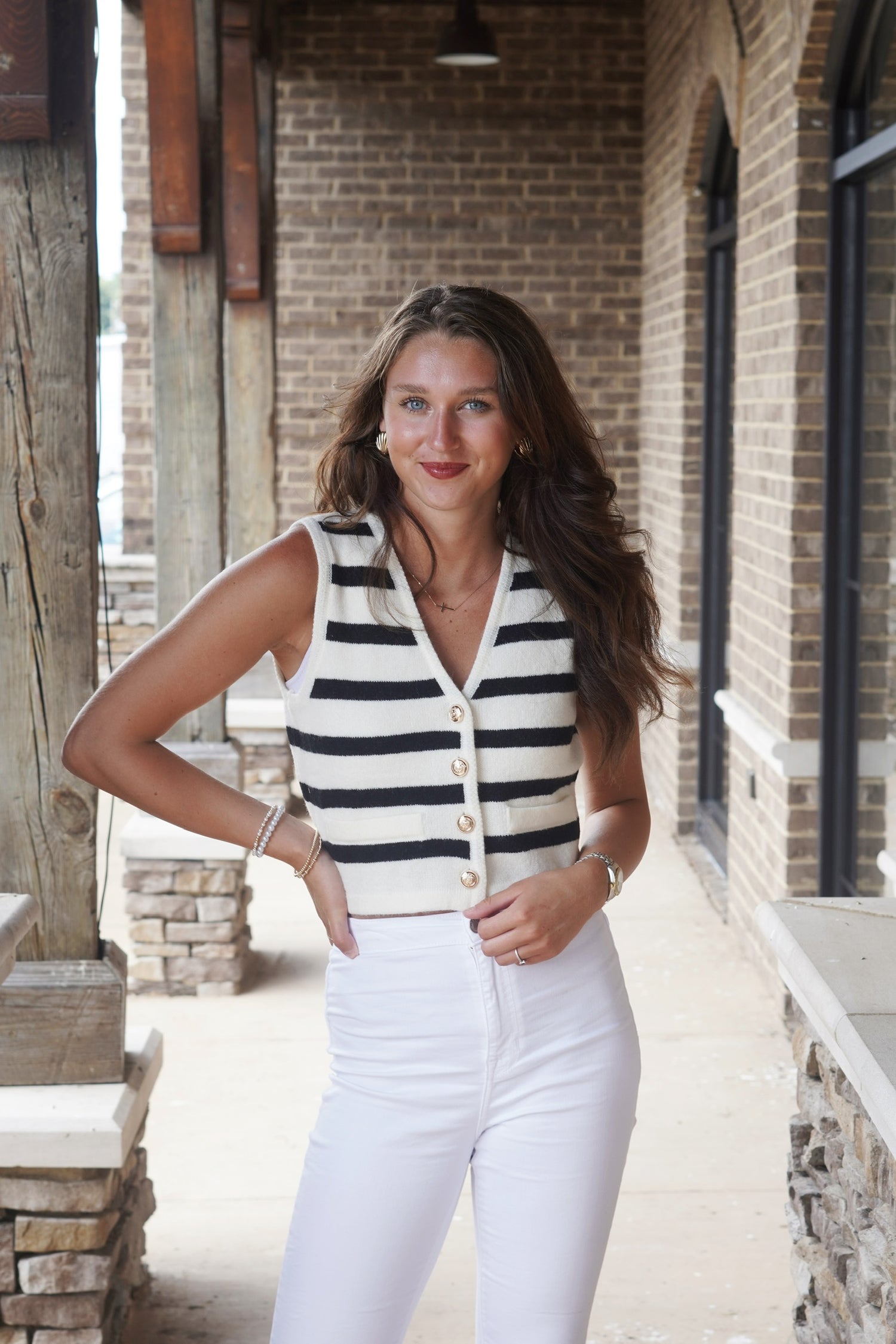 Timeless Striped Sweater Vest V-Neckline Faux Front Pockets Gold Buttons White Striped Sleeveless Cropped Fitted 43% Acrylic, 29% Nylon, 28% Polyester ivory and white striped