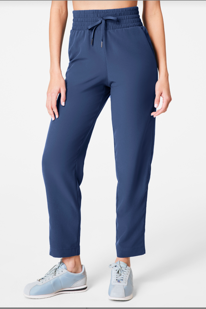 straight slim indigo pants with an elastic waistband and drawstring . 