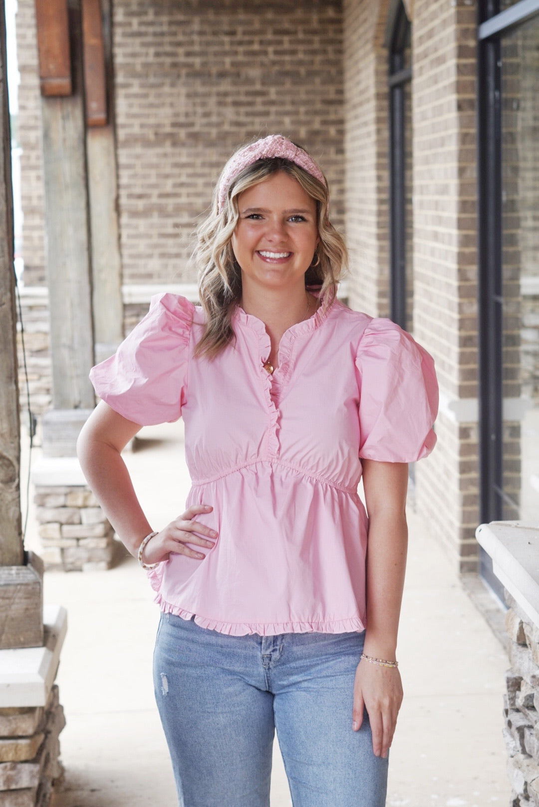 Rosé Ruffle Hem Puff Sleeve Blouse V-Neckline w/ Ruffle Detail Short Puff Sleeves Cinched Bodice&nbsp; Color: Pink Full Length Ruffle Hem&nbsp; 100% Cotton