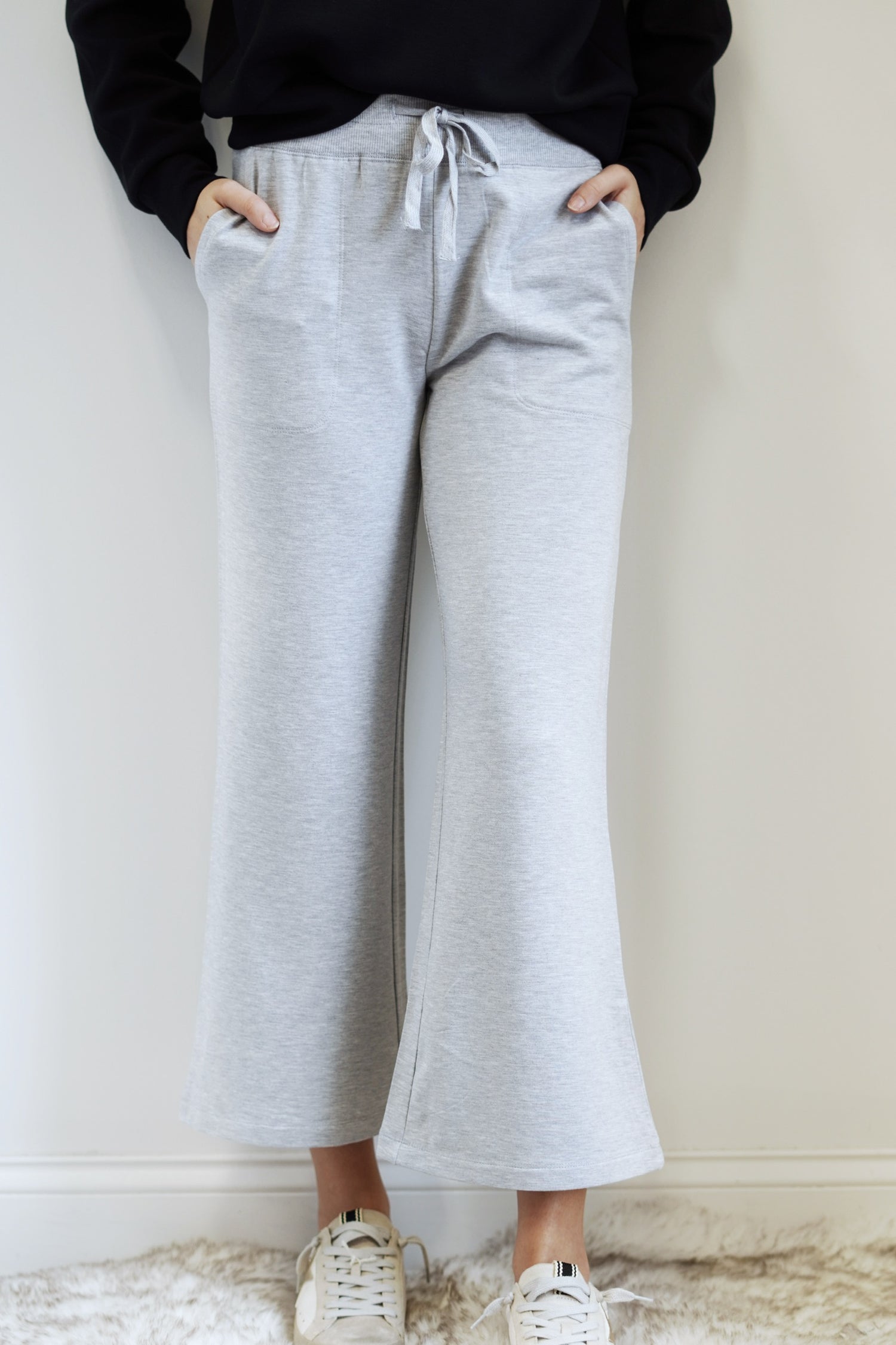 Jet Set Modal Fleece Pant Relaxed Fit Modal Fleece: 97% Modal, 3% Spandex Wide Leg Colors:  Grey Flat drawcord Stitch detail pockets Wash cold, dry flat