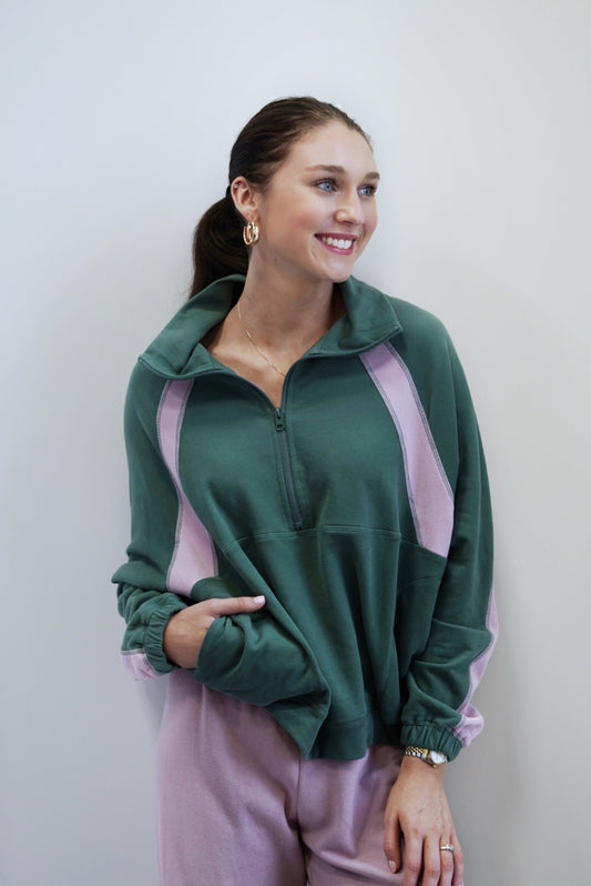 Quinn Quarter Zip Pullover Zip Up Collar Neckline Long Sleeves with Cinched Cuffs Side Pockets Color: Green with Pink Color Block Full Length Relaxed Fit 90% Cotton, 10% Polyester
