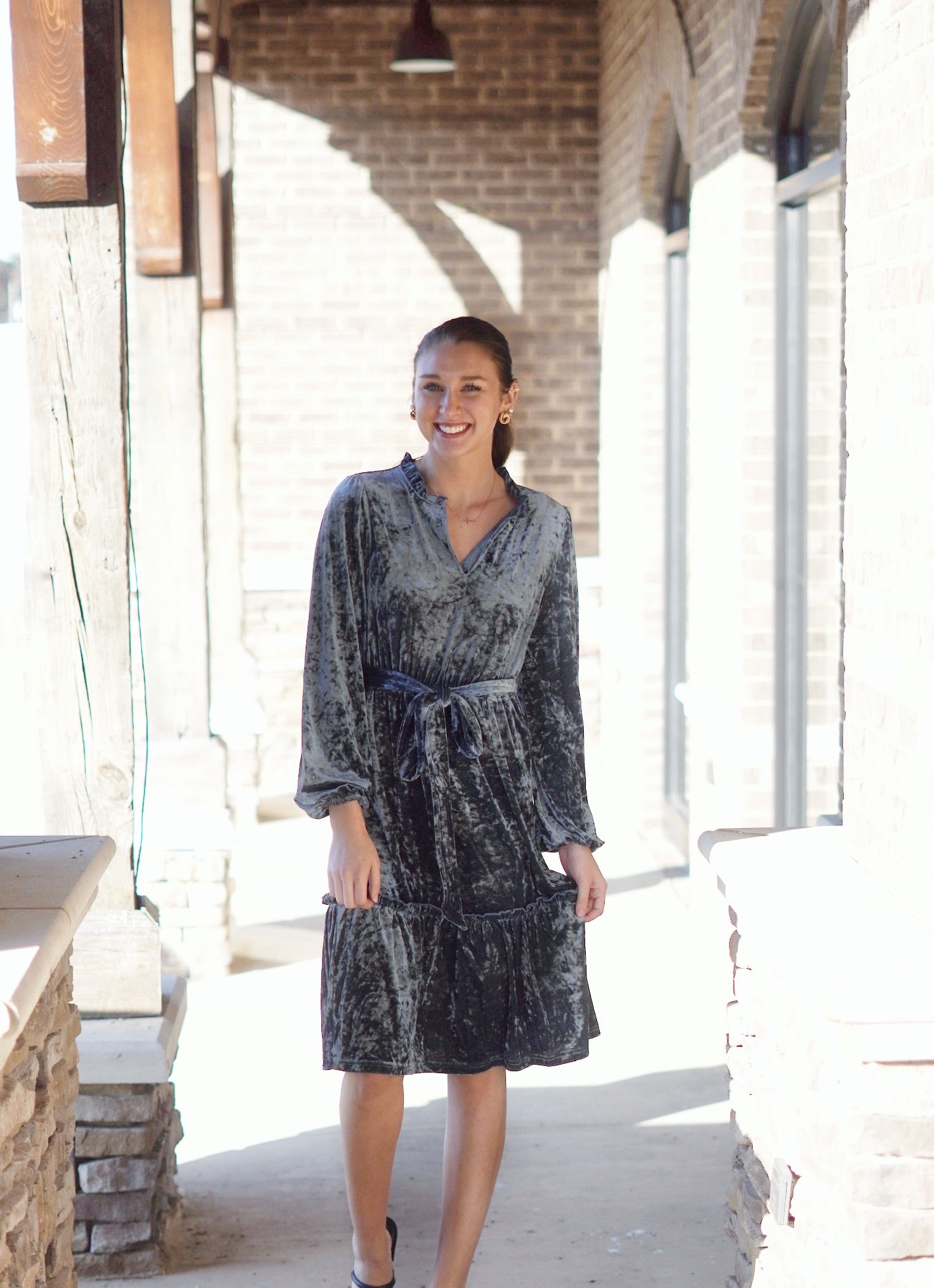 Val Velvet Classic Dress V-Neckline Long Cuffed Sleeves Waist Tie Tiered Ruffle Detail Ruffle Neckline Color: Deep Blue Knee Length 95% Polyester, 5% Spandex