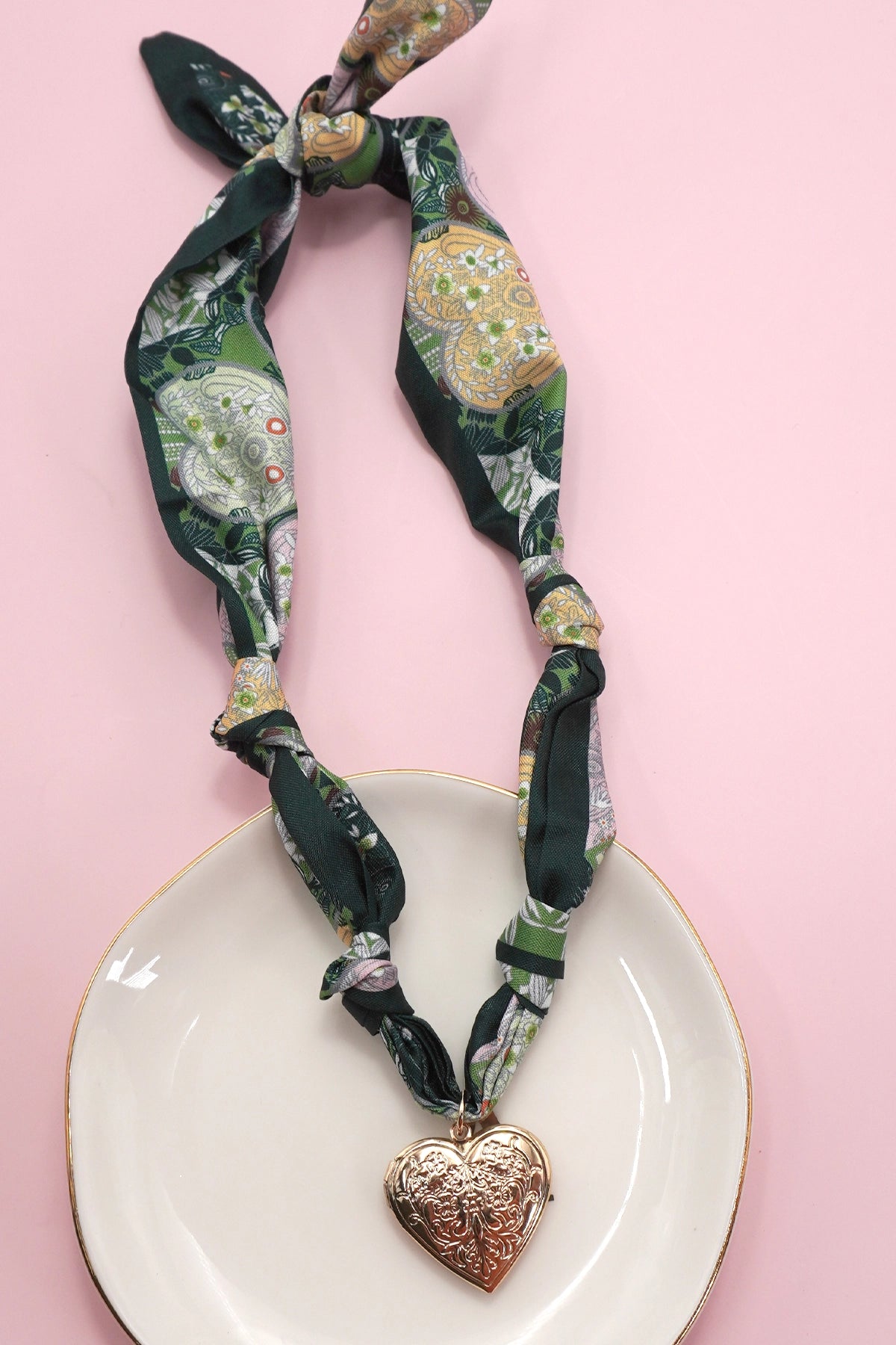 Handmade Scarf Necklace - Heart is a crafted with care, this soft fabric scarf doubles as a stylish necklace, featuring a delicate heart charm that adds a sweet, personal touch. Lightweight and versatile, it is perfect for layering.
