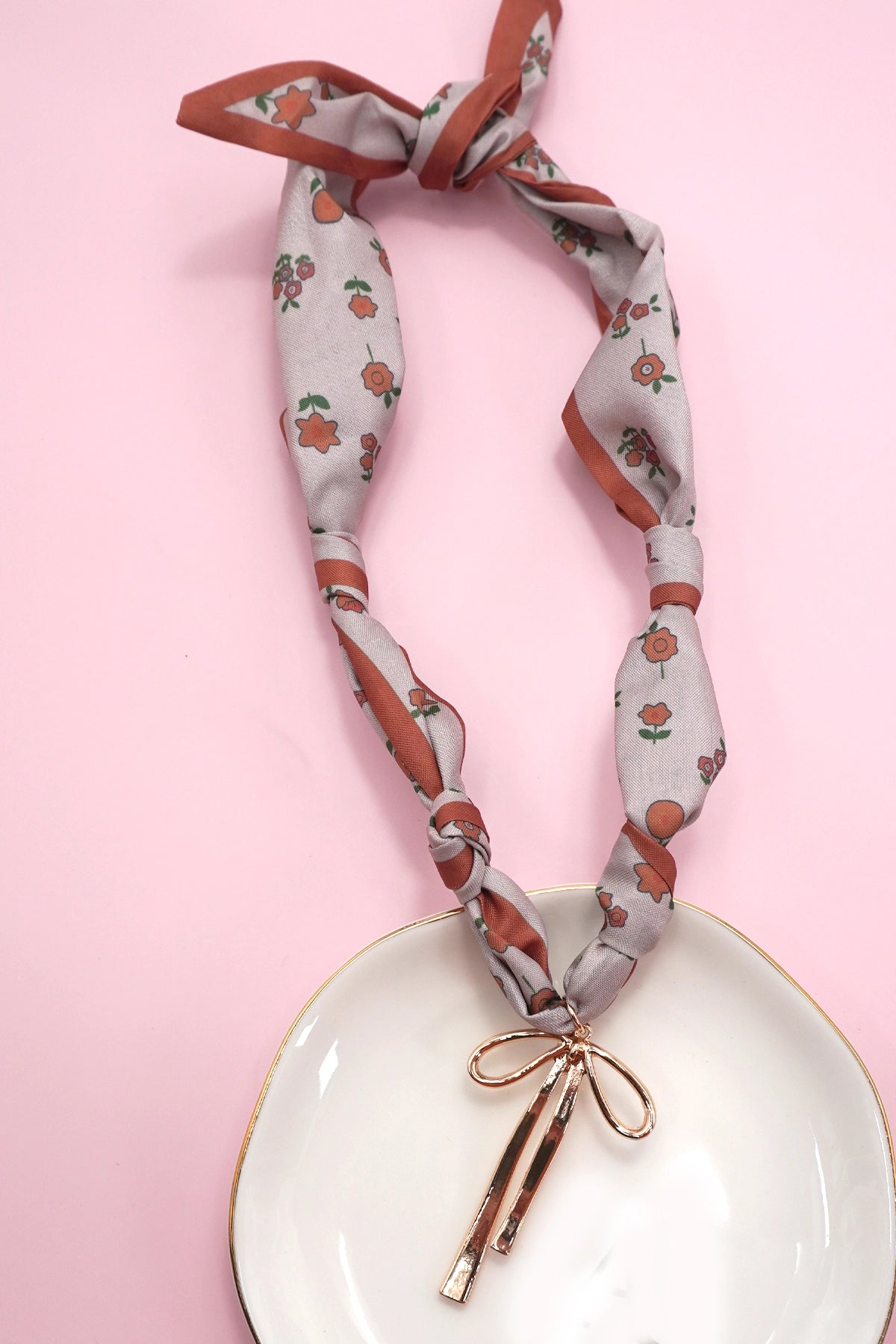 Handmade Scarf Necklace - Heart is a crafted with care, this soft fabric scarf doubles as a stylish necklace, featuring a delicate heart charm that adds a sweet, personal touch. Lightweight and versatile, it is perfect for layering.
