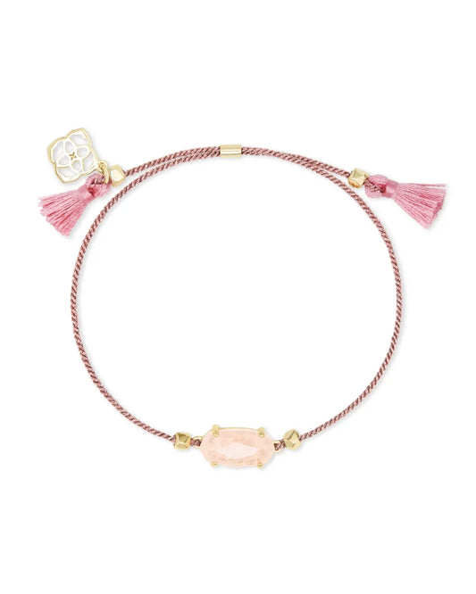 pink cord tassel bracelet with a rose quarts stone