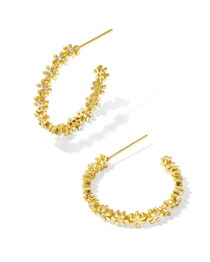 gold hoop earrings formed by white crystal centered daisies