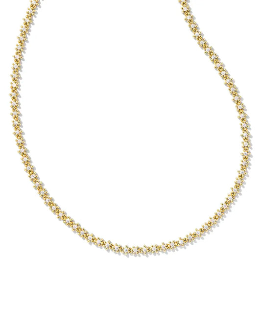 gold strand necklace of white crystal daisies