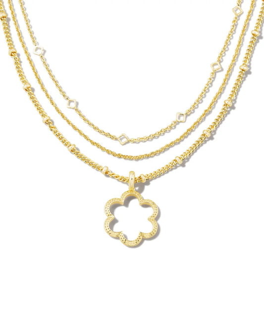 Get the layered look in one step with the Susie Convertible Multi Strand Necklace in Gold. Designed with three textured chains and an open-frame floral pendant, it’s a necessary addition to your growing collection. Plus, it can be worn multiple ways!  Metal  14K Gold Over Brass   Closure  Lobster Clasp   Size  16", 18.5", Chains With 3" Extender, , 1.35" L X 1.18" W Pendant