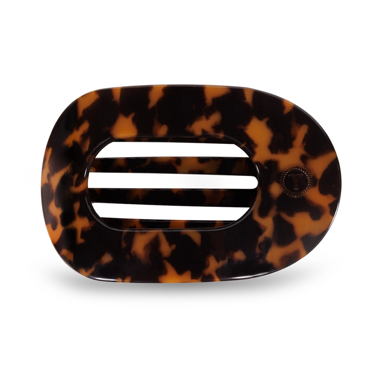 flat round hair clip in a tortoise color
