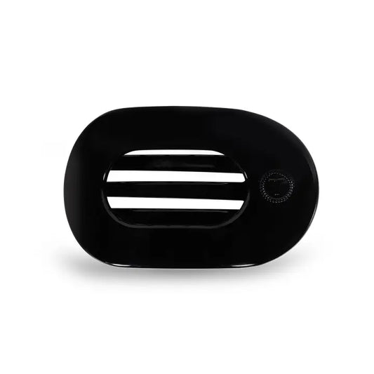 medium sized flat round hair clip int he color black