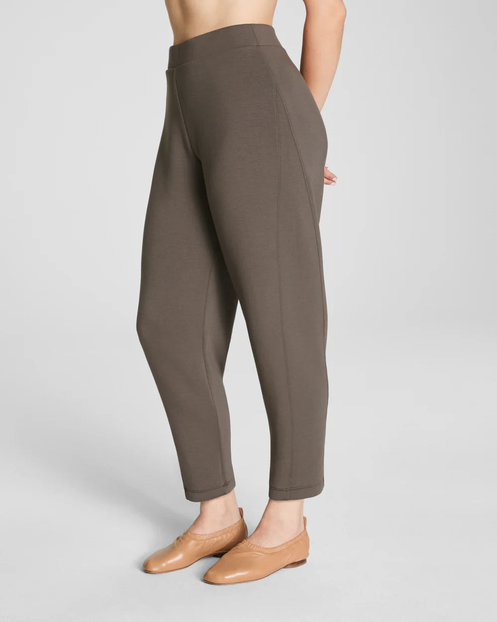 Spanx Air Essentials Barrel Pant
High Rise
Relaxed Tapered Leg 
Flat-front Waistband: No Drawstrings
Full Length
Color: MIneral (greenish, brown)