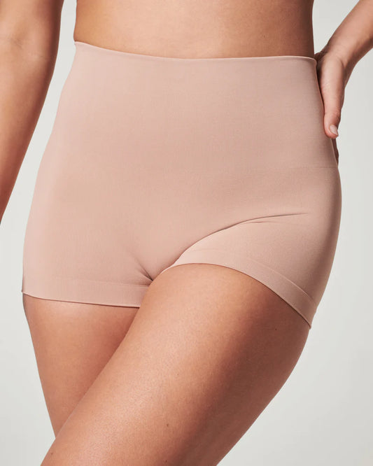 Spanx EcoCare Boyshort Full coverage, front and back Nude Rise: 27”,Inseam: ¾” Shaping waistband with seamless comfort doesn’t dig 89% Nylon, 10% Elastane, 1% Cotton Care: Machine Wash Cold, Gentle Cycle. Only Non-Chlorine Bleach When Needed. Lay Flat To Dry. Do Not Iron.