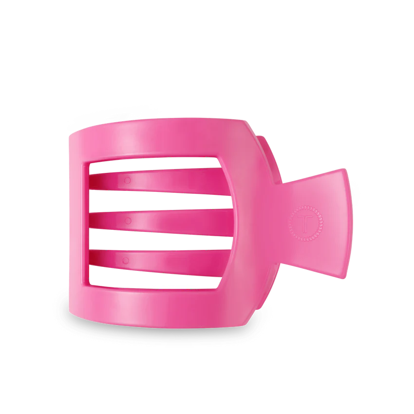Unwind and relax with the new TELETIES Flat Square Hair Clip! Designed with our same innovative material that is nearly unbreakable, this clip is perfect for lying down, doing yoga or simply laying back without discomfort.&nbsp;The large size is great for thick hair and is 4.1 inches long. Paradise Pink