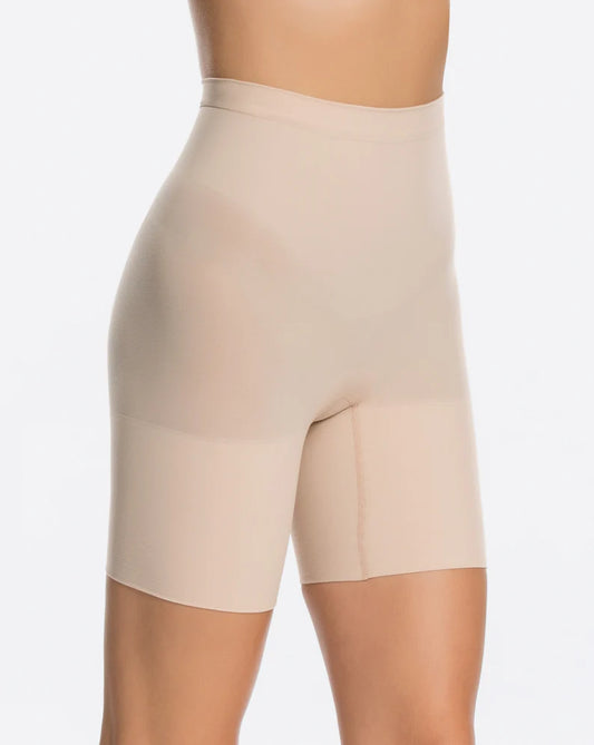 Nude spanx power shorts mid-thigh length, shown from a different angle.