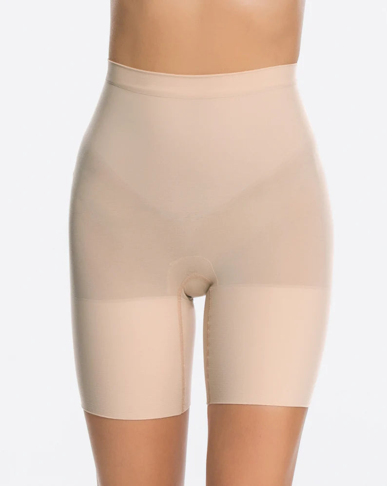 Spanx Power Short Shaping zones target the stomach and provide all-over support with gradual release for comfort and movement Cotton blend gusset – wear as underwear and eliminate VPL (Visible Panty Lines) 55% Nylon, 45% Elastane. Care: Machine Wash Cold, Gentle Cycle. Only Non-Chlorine Bleach When Needed. Tumble Dry Low. Do Not Iron. Nude is Pictured here.
